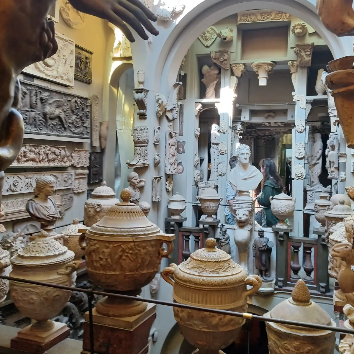 Layers of sculpture, busts and antique urns inside Sir John Soane's Museum