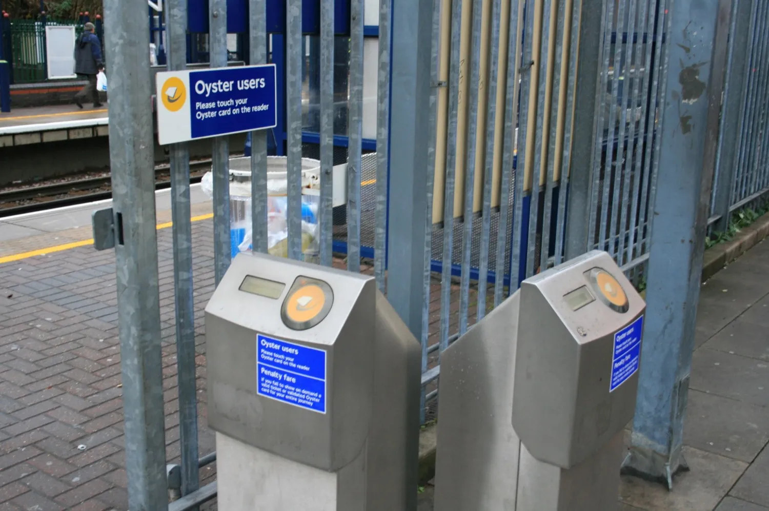 Contactless and Oyster card readers at a London Underground gate